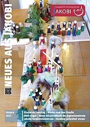 Der Gemeindebrief Ostern 2921: eine Osterkrippe, die während des Kindergottesdienstes erbaut wurde mit Szenen aus dem Geschehen von Karfreitag bis Ostern.